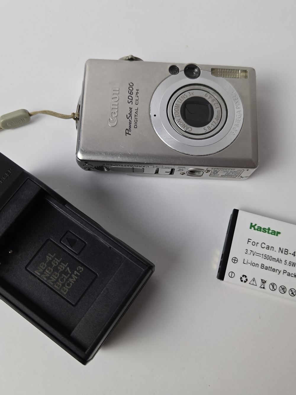 Canon PowerShot Digital ELPH SD600 6.0MP Camera w/ Charger/Batt. Tested & Works! - Picture 13 of 15